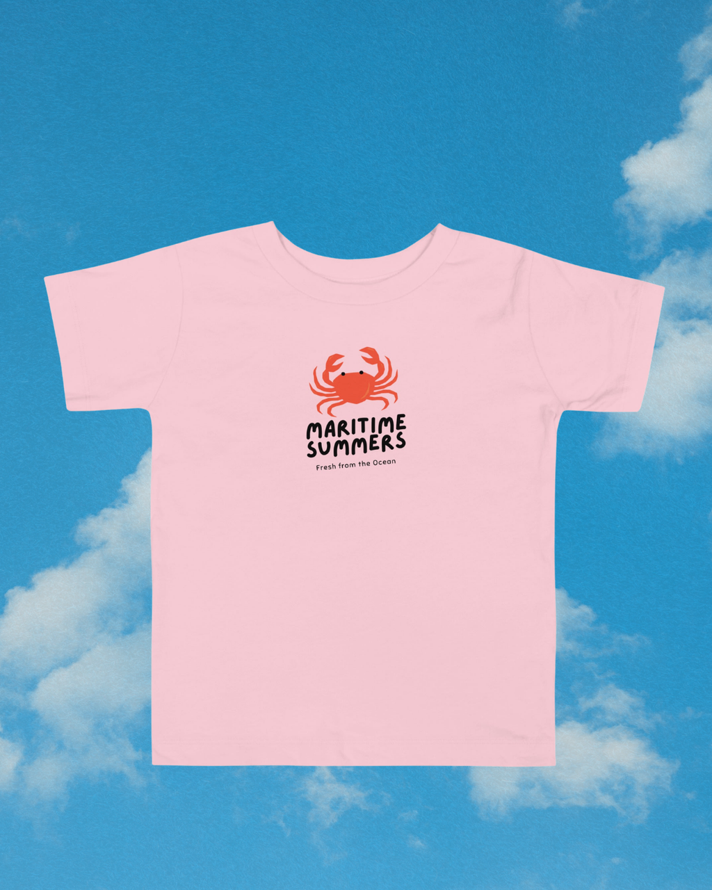 Maritime Summers crab toddler tee in pink against blue summer sky